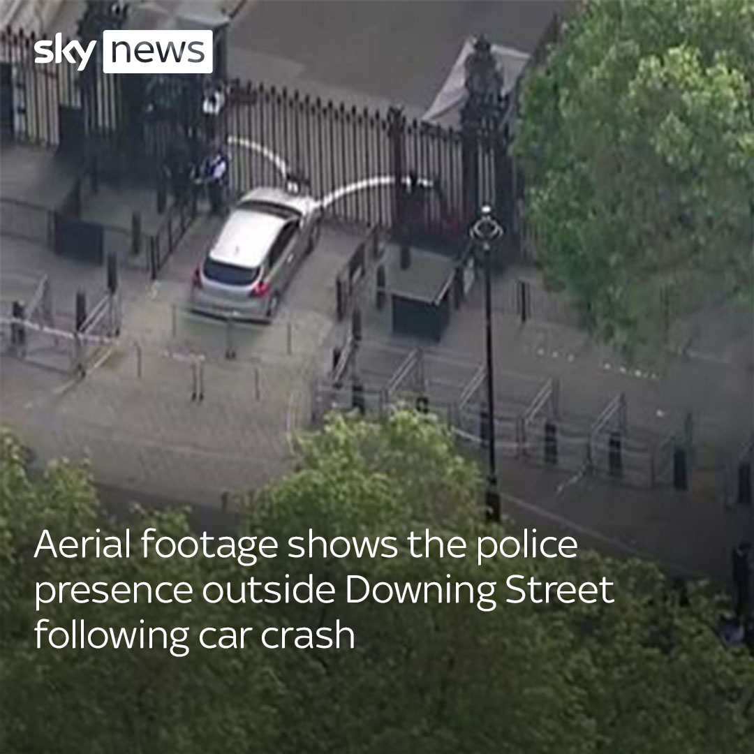 A silver Kia crashed into the gates of Downing Street at around 4.20pm. This aerial footage shows the crash site and police presence outside Downing Street following the incident. Read more 👉