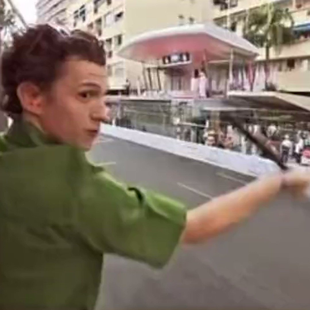 Tom Holland almost hit himself in the face with the chequered flag in Monaco 😅🏁 (via tomholland2013/IG)