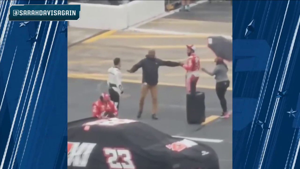 Aric Almirola and Bubba Wallace on pit road during the rain delay. 👀