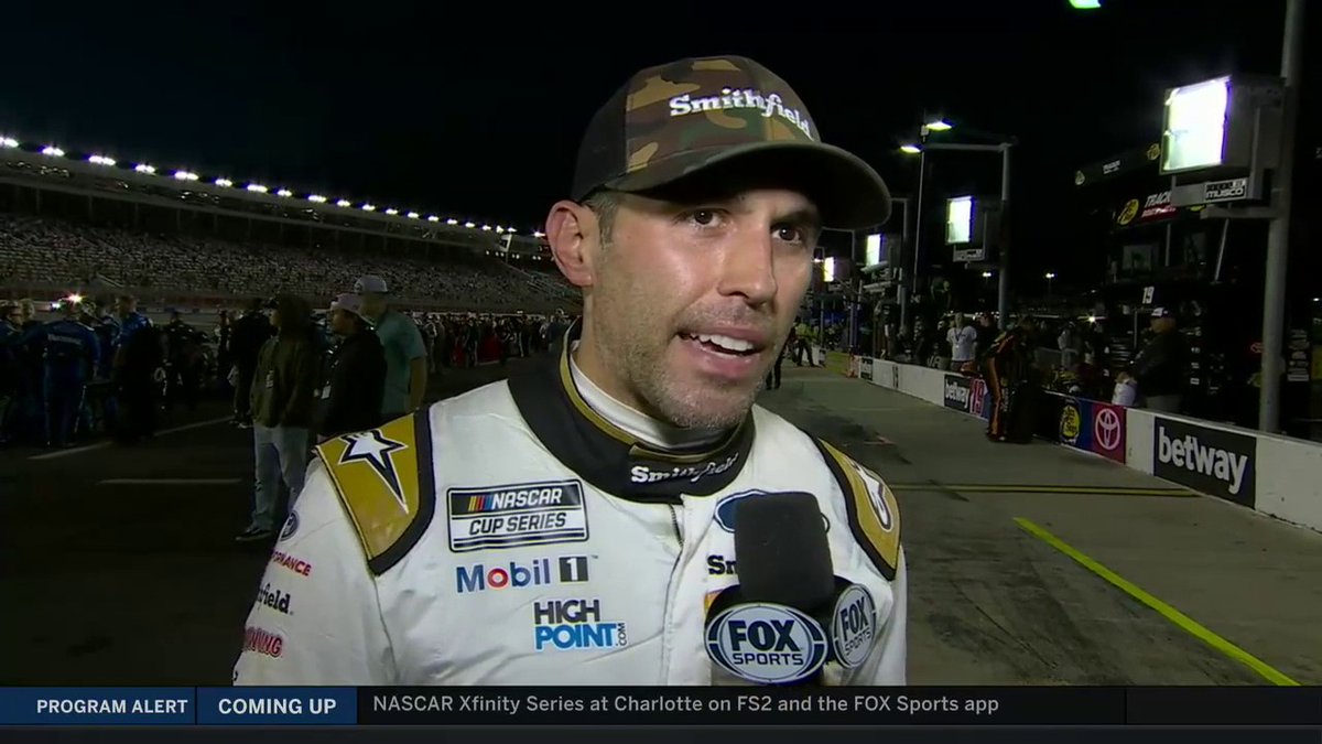 Bubba Wallace and Aric Almirola on the pit road shove.