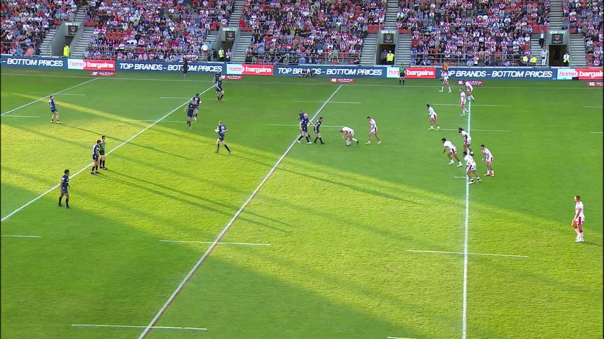 What a hit from Paasi on Singleton as St.Helens R.F.C. look to extend their two point lead over Wigan Warriors 🍒⚪️ #SkyRL