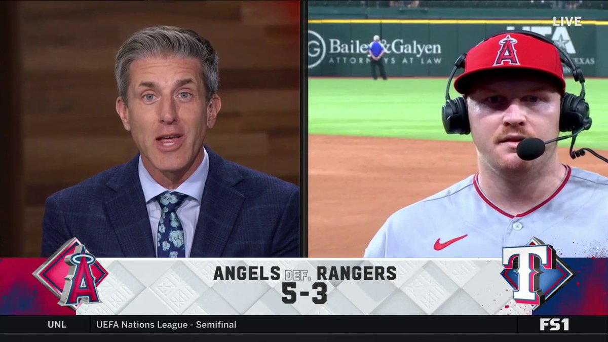 Angels catcher Chad Wallach talks with Kevin Burkhardt after the 5-3 win tonight over the Rangers