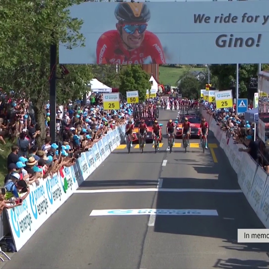 "Thank you for all the light you brought to the world, Gino." Riding in memory of Gino Mader, Bahrain Victorious lead the peloton across the finish line.