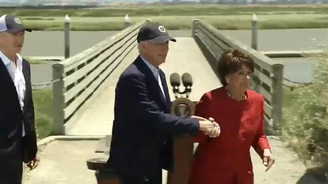 Rep. Anna Eshoo physically pulls Biden across the stage to meet with attendees after his speech