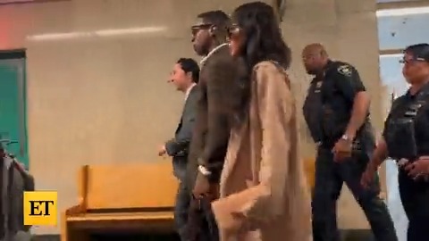 Marvel star Jonathan Majors arrives in court holding hands with girlfriend Meagan Good. Once inside the courtroom, Good had her arm around Majors and stroked his head. Majors is facing assault and harassment charges for a case involving an ex-girlfriend.