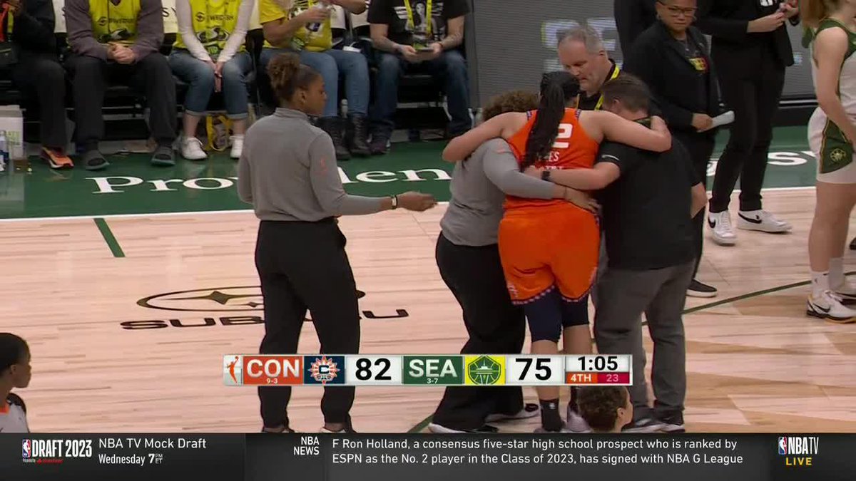 Brionna Jones was helped off the court after going down with an apparent leg injury.