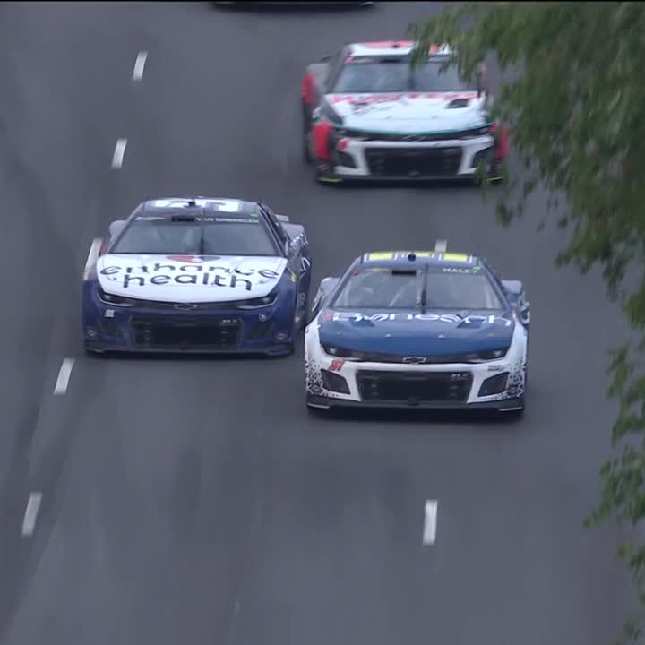 A thrilling battle for the top spot! Shane van Gisbergen gets past Justin Haley! #NASCARChicago