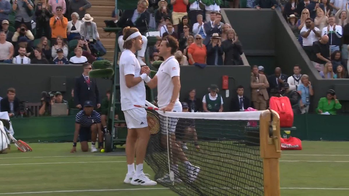 Tsitsipas prevails in an EPIC 💥 @steftsitsipas outlasts Dominic Thiem in an exhilarating five-set encounter to book his place in the second round, 3-6, 7-6(1), 6-2, 6-7(5), 7-6(8) 😮 #WImbledon