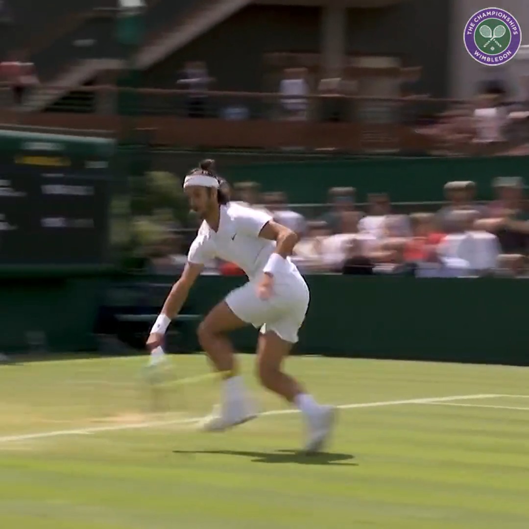 Shot of The Championships?! 🤯 A moment of pure magic from Lorenzo Musetti 🪄 #Wimbledon