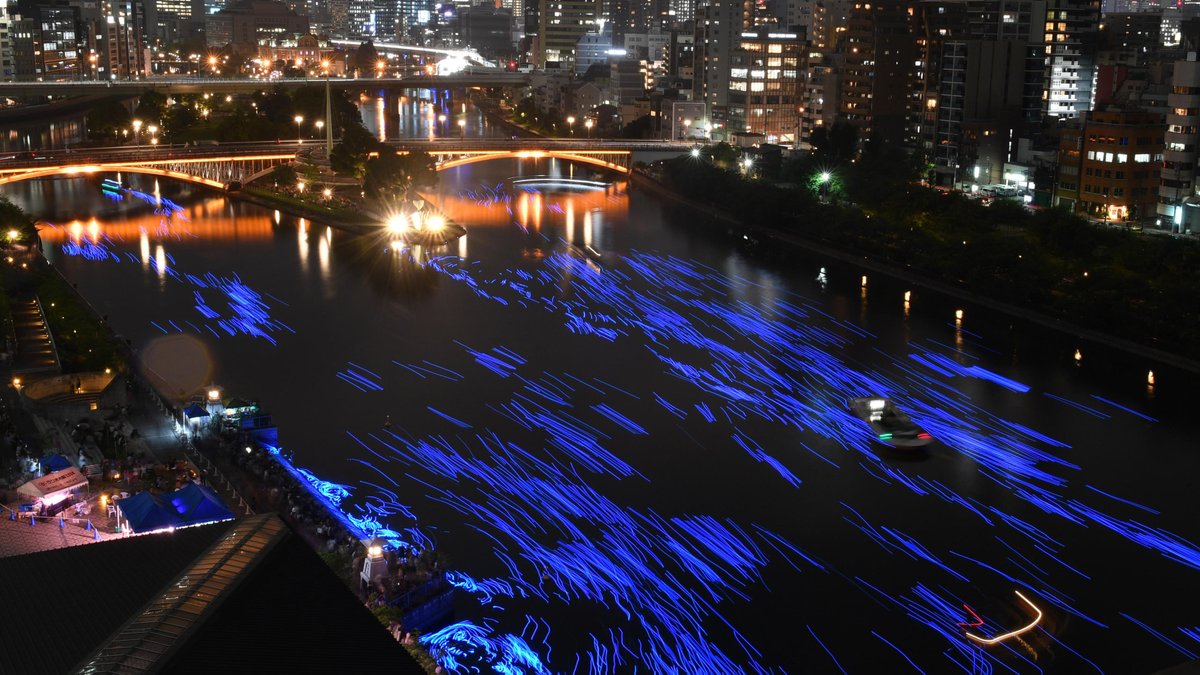 40,000 LED ‘prayer stars’ float down the Tenma River in Osaka, recreating the Milky Way on Tanabata