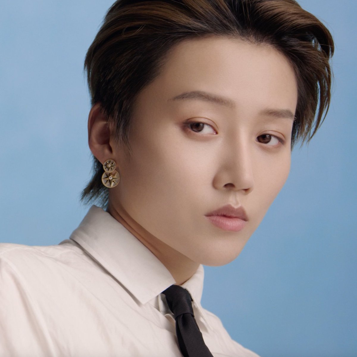 Stand out with #DiorJoaillerie 'Tribales Rose des Vents' earrings by Victoire de Castellane. In yellow or rose gold, follow the example of singer and Dior ambassador in China XIN LIU and wear them solo, with the wind rose or ornamental stone side facing out. © Tyler Mitchell