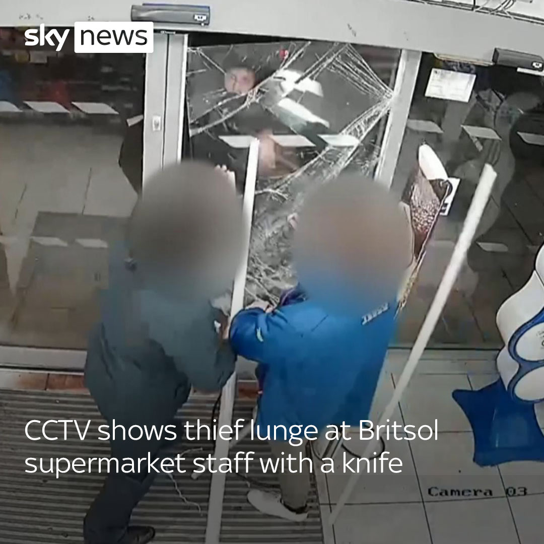Dramatic footage released by Avon and Somerset Police shows an armed man attempting to smash the door of a supermarket as staff try desperately to keep him out. Latest UK news: