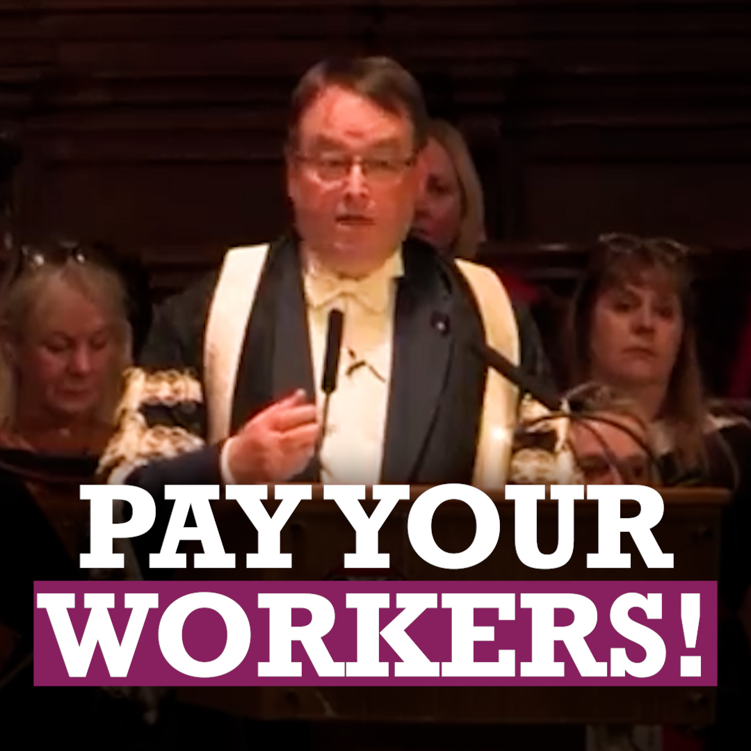Students disrupt a graduation ceremony to show their support for university staff.