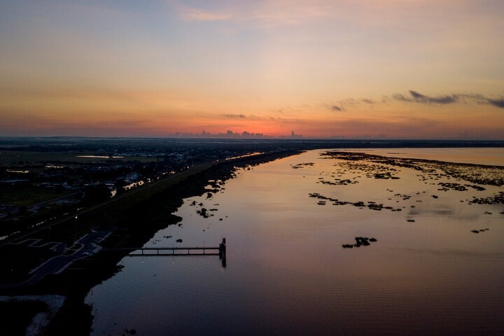 Lake Okeechobee has long pumped life-giving water into Florida's swampy interior. But the use of phosphorus fertilizers has encouraged the growth of a poisonous algae that is threatening wildlife, pets, people and cities.