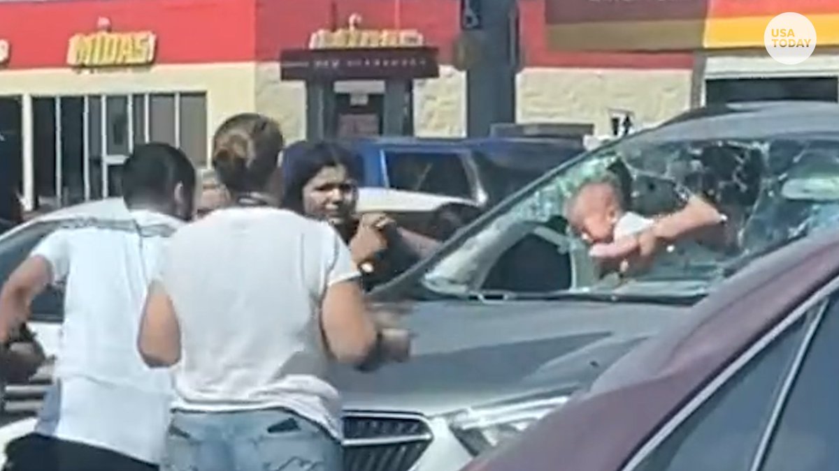 A car's windshield was smashed in order to rescue a baby from inside the hot vehicle.