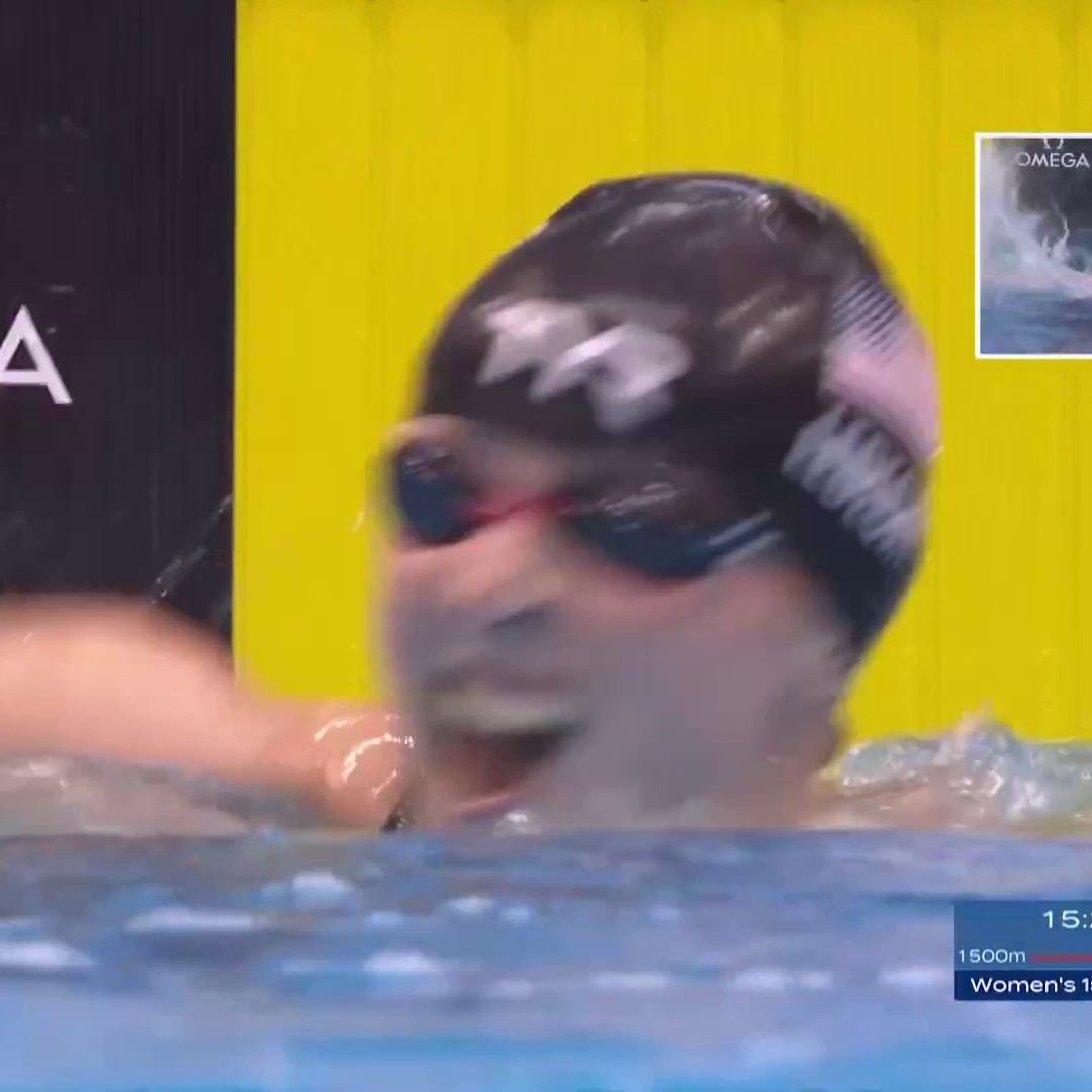 THAT'S KATIE LEDECKY! Katie Ledecky is the first person to win five world titles in two different events AND she ties Michael Phelps for the most individual world golds in swimming (15). And she won this 1500m free world title by 17 seconds. 🤯 #AQUAFukuoka23