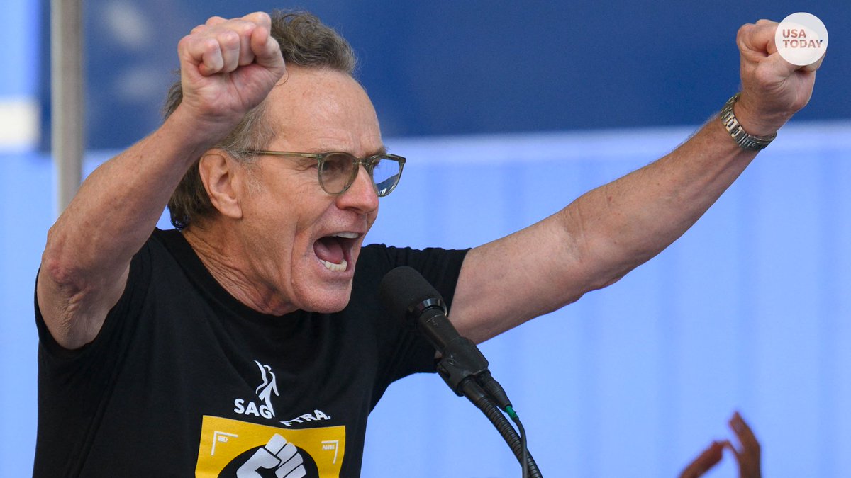 "Breaking Bad" star Bryan Cranston slammed the use of AI during a SAG-AFTRA rally: "We will not be having our jobs taken away and given to robots."
