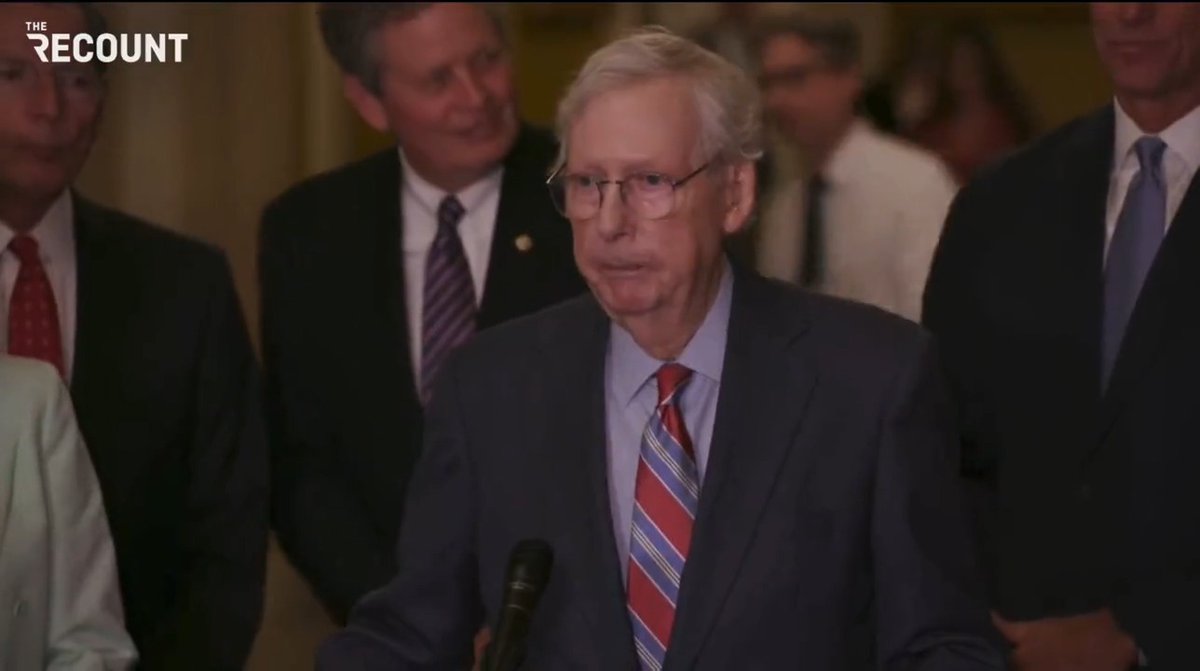 Senate Minority Leader Mitch McConnell begins his weekly press conference, freezes for 20 seconds, and then is escorted away by fellow Republicans.