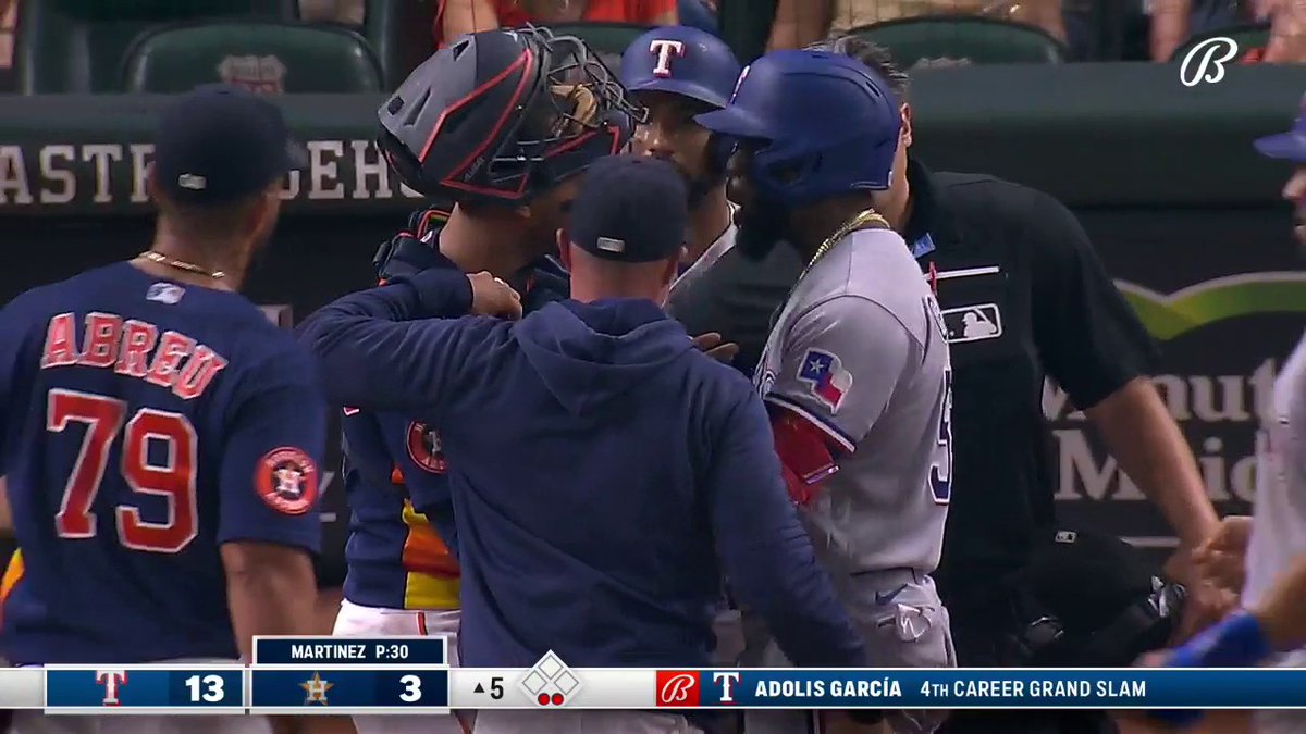 Benches clear in Rangers-Astros game after a grand slam by Adolis Garcia!! (via @BallySportsSW )