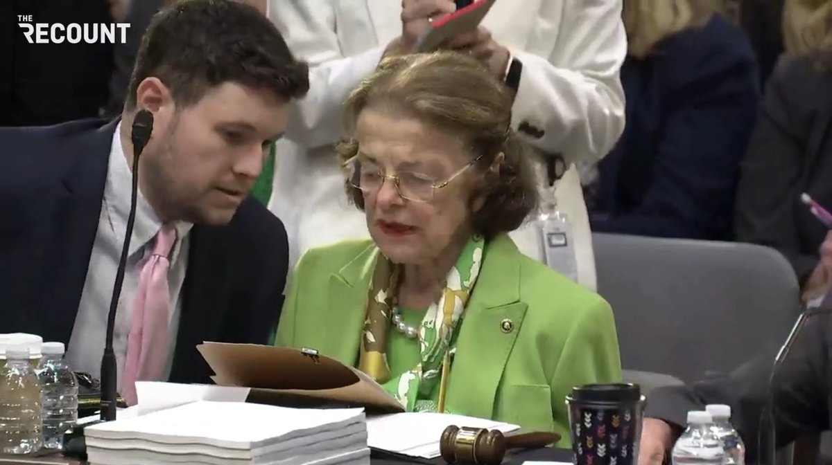 A confused Sen. Dianne Feinstein trying to cast her vote for an $823 billion military budget is reminded by colleagues to “just say aye”