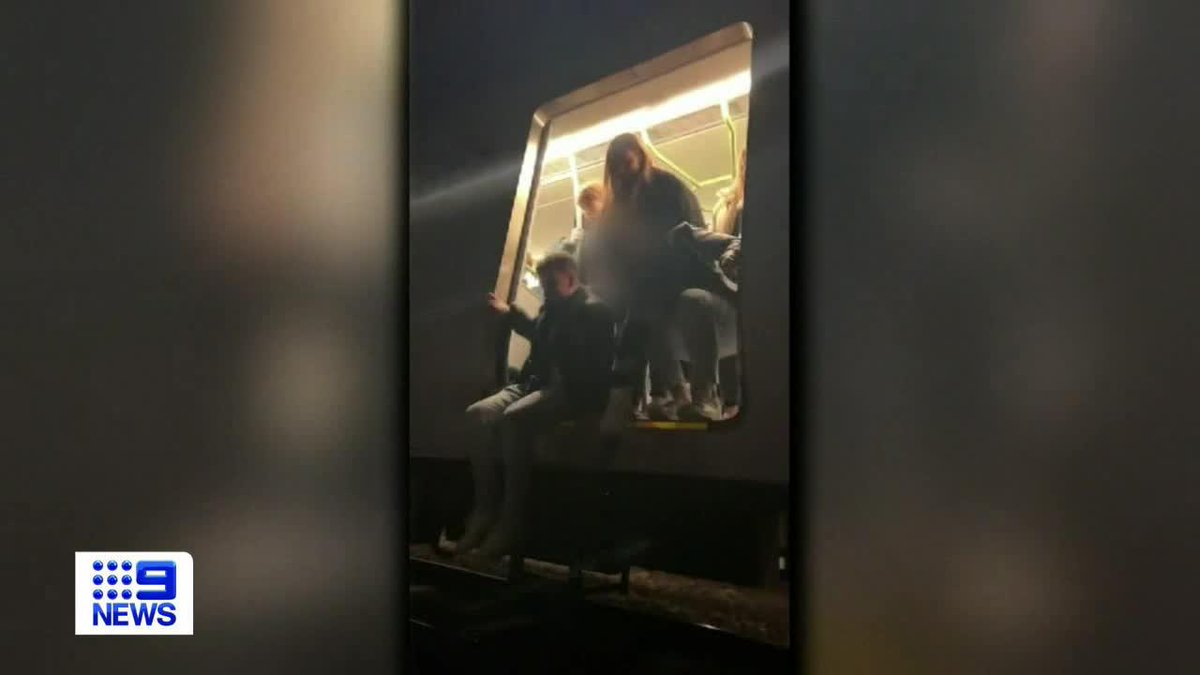 Carriage loads of frustrated passengers, including footy fans, have forced open train doors and jumped onto tracks in the darkness at Clifton Hill. Emily Rice #9News