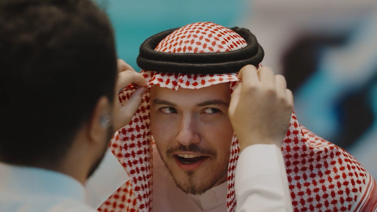 Time for SirActionSlacks to dress like the locals! 😎 We got Abdulaziz Alrasheed to help him out with the DRIP! 👔🎩👟 #Gamers8 #TheLandOfHeroes