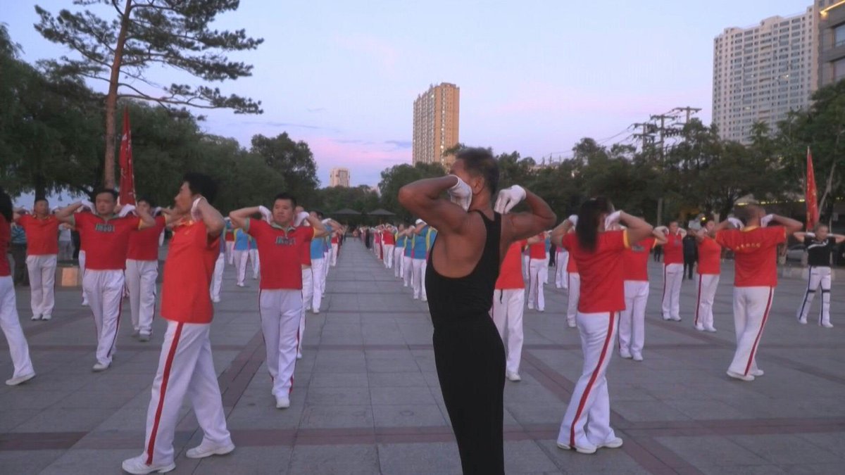 VIDEO: Hundreds of dancers twirl in unison by a riverside in northeastern China, thrusting their hips and shimmying their shoulders in a routine that has taken the country by storm.