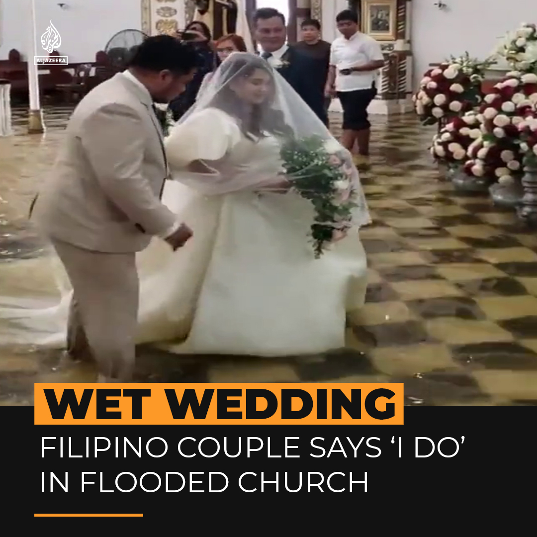 Love conquers all! Witness the resilience of this Filipino couple as they wade down the aisle to exchange their vows amidst monsoon flooding👇