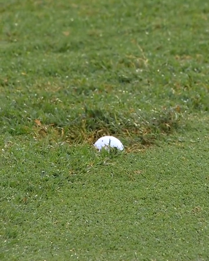 From unlucky to REALLY unlucky. Solo leader Russell Henley rolls into a divot on the 16th hole.