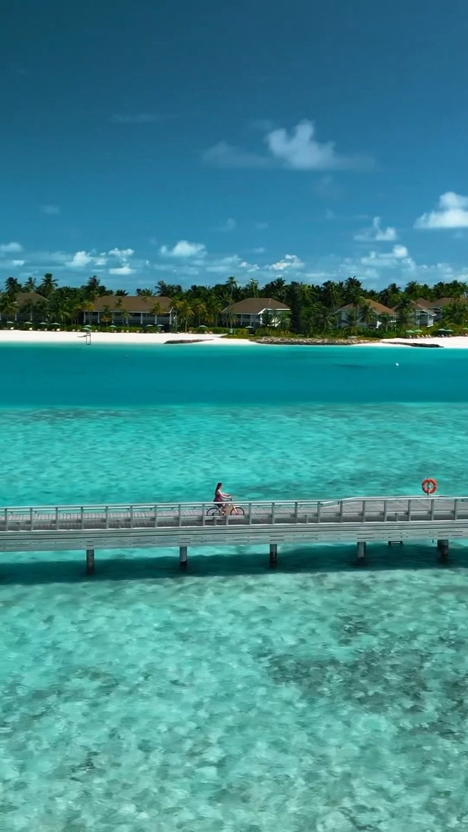 Bike rides in the Maldives hit different .. 📷: k8.gale, ishotmaldives 📍: hardrockhotelmaldives , crossroadsmaldives #WorldsLeadingDestination2022 #Maldives #VisitMaldives #SunnySideofLife