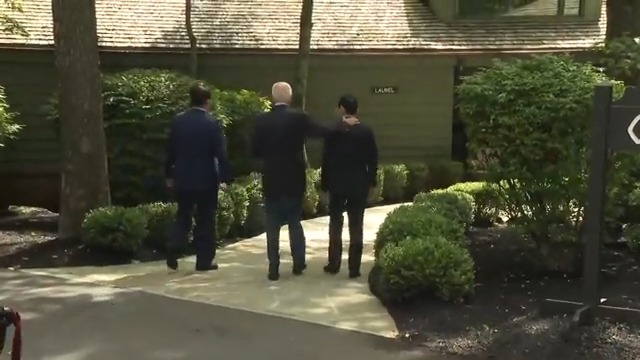 Biden ignores questions and wanders back inside after a photo op with the Japanese prime minister and the South Korean president