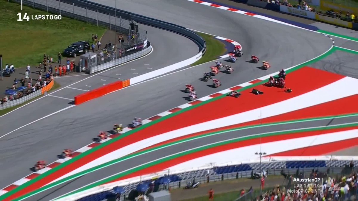 🚦 GAME ON IN AUSTRIA! 🚦 Pecco Bagnaia gets the launch but there's chaos behind! 🤯 #AustrianGP 🇦🇹