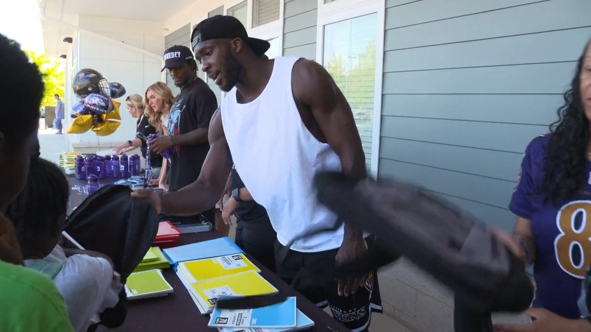 "Grateful that I get to celebrate back to school with you." Nelly and Ro host back to school events ๐