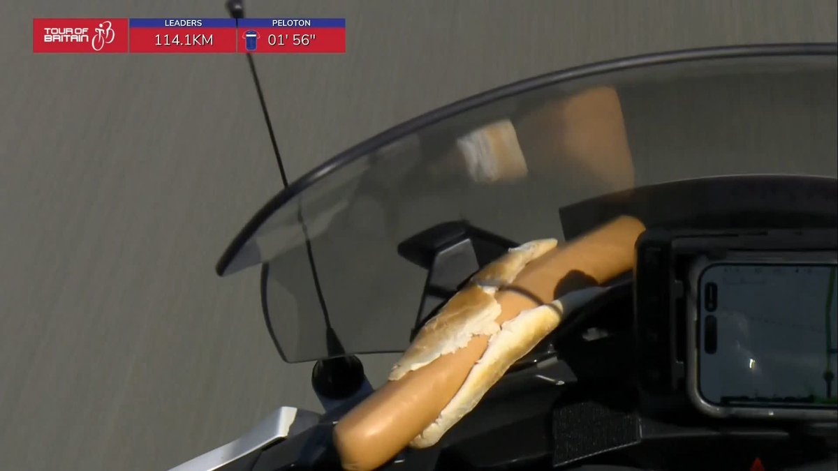 Hotdog at the ready 🌭 Our motorcyclist is a bit peckish at Lloyds Tour of Britain 😅