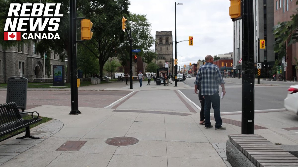 Once again the lady with the pink adult-sized tricycle followed Chris Barber as he exited the Ottawa Courtroom.