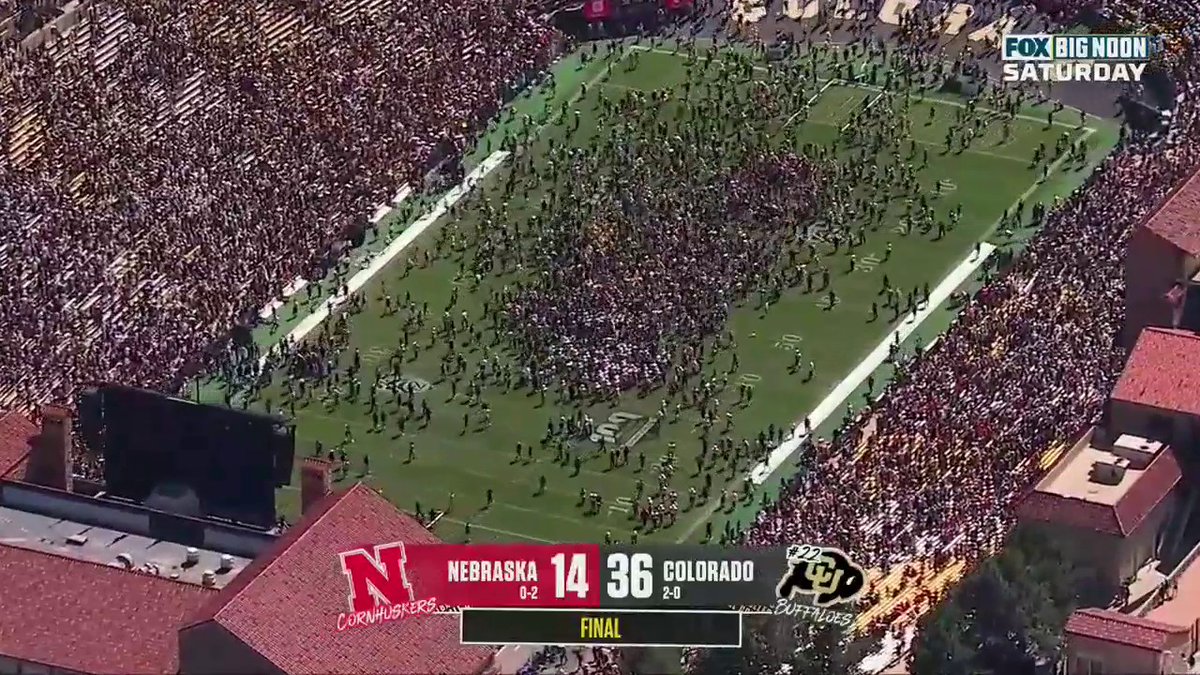 GO CRAZY COLORADO Colorado Buffaloes Football fans rush the field after their win against Nebraska