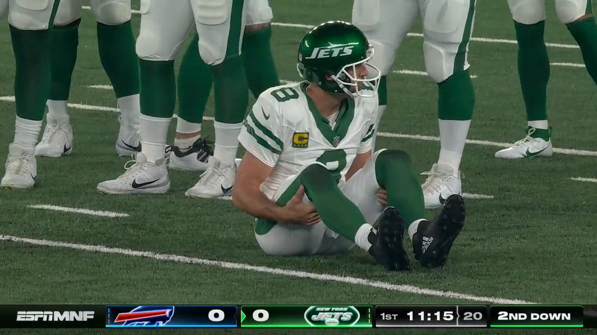 Aaron Rodgers was injured and helped off the field on the first Jets drive vs. the Bills.