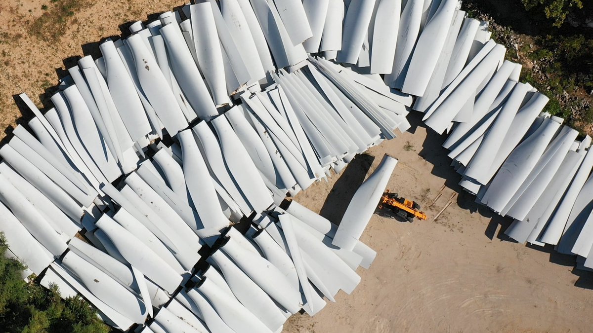 Wind turbine blades are nearly impossible to recycle. This is how a company is shredding the blades so they can be used as fuel in cement making