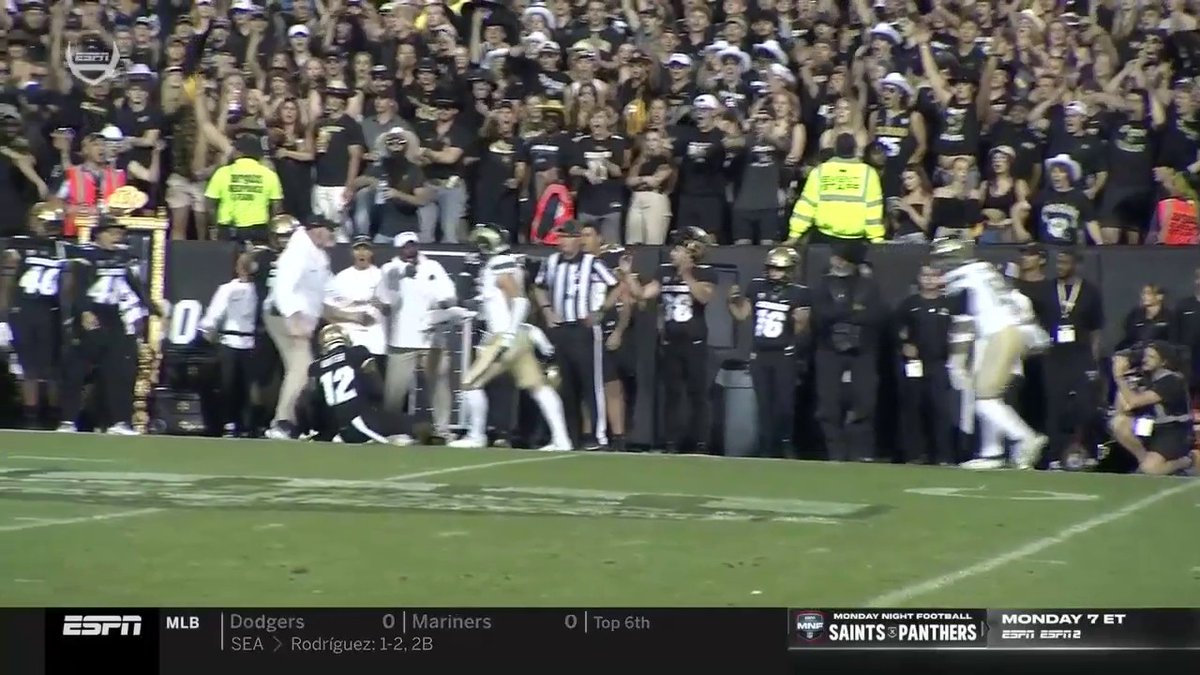 A penalty is called after this hit on Travis Hunter