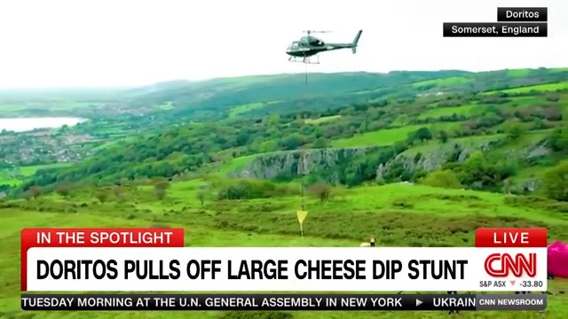 Doritos set a world record when the company used a helicopter to dip a giant chip into a cheese mixture and reportedly stretched the cheese 49 feet without breaking