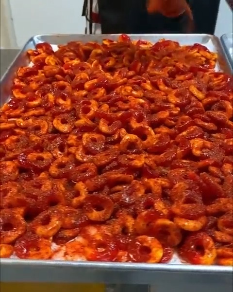 And you thought you loved sour peach rings BEFORE... Lucha Frutos Candy douses them in chili powder and a special chamoy mix!! 🍑💥 (Good news: You can order their candy online!)