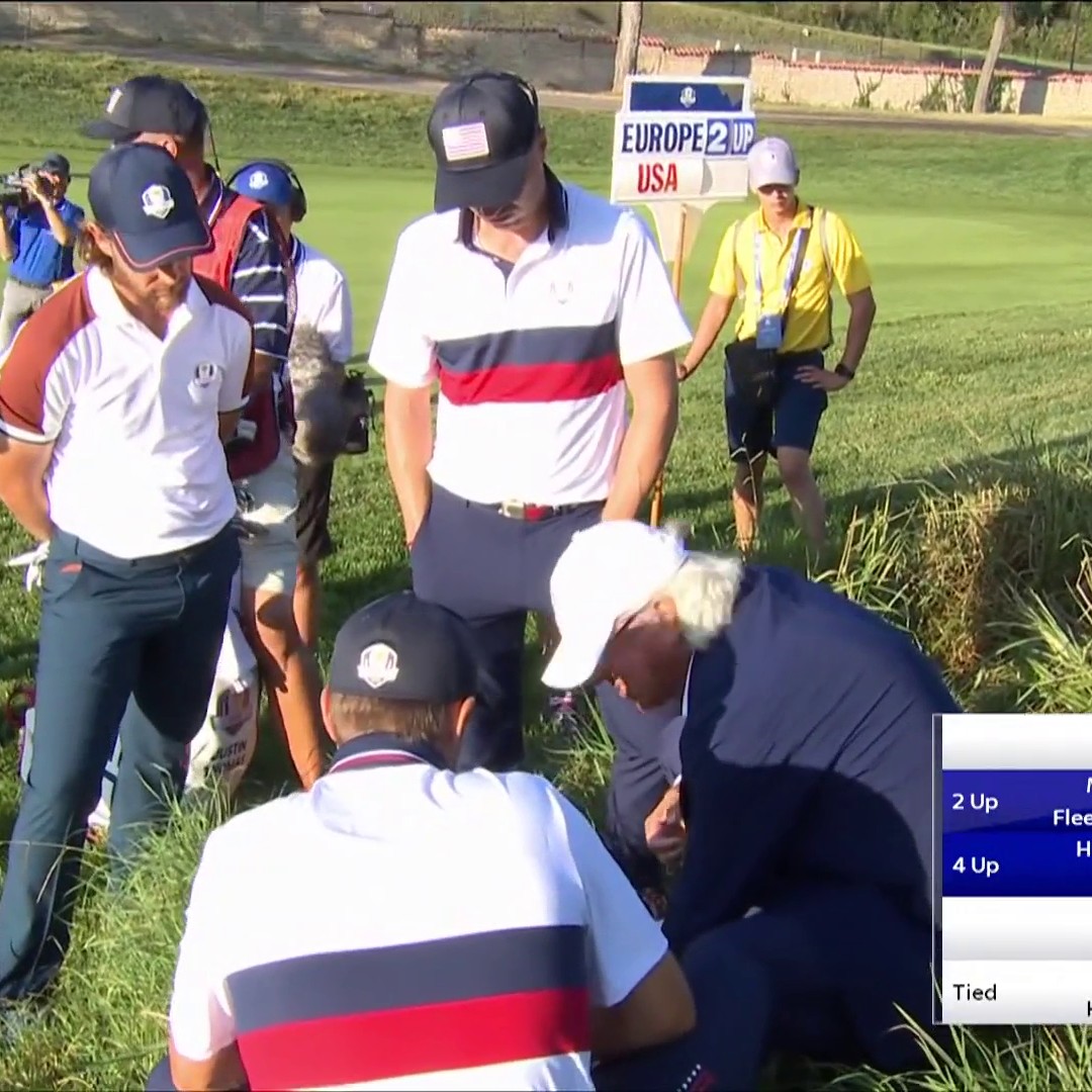 Tommy Fleetwood just stood watching Thomas and Spieth get a ruling on their ball 🤣