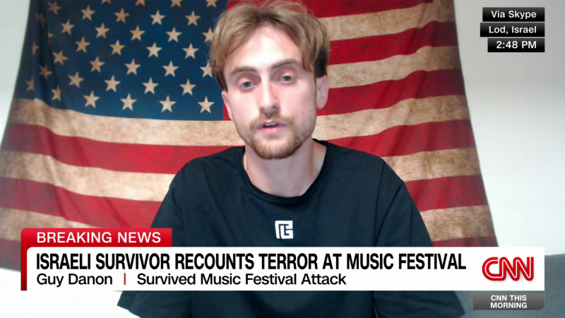 Guy Danon speaks to CNN about how he survived the Hamas attack on the music festival in Israel with the help of a stranger.