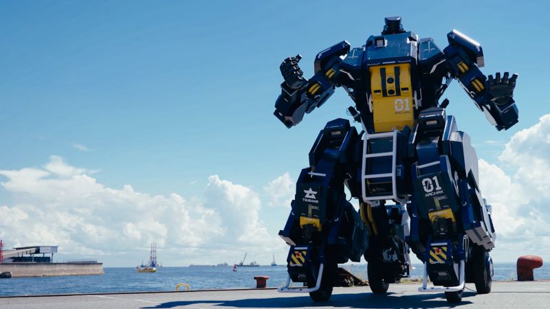 A human is controlling this Japanese robot from the inside. Here's how they do it