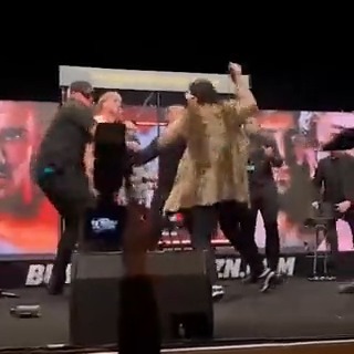 Logan Paul and Dillon Danis exchange bottle throws before being escorted off stage 😳 #PaulDanis #XSeries10