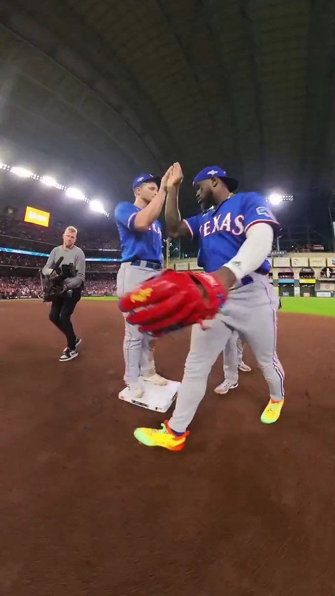 Postgame high-fives with the Texas Rangers after their #ALCS Game 1 victory. #Postseason