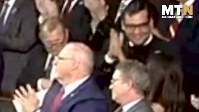George Santos and Lauren Boebert high five right after Republicans vote to install their new extremist Speaker of the House, a perfect encapsulation of the Republican Party.