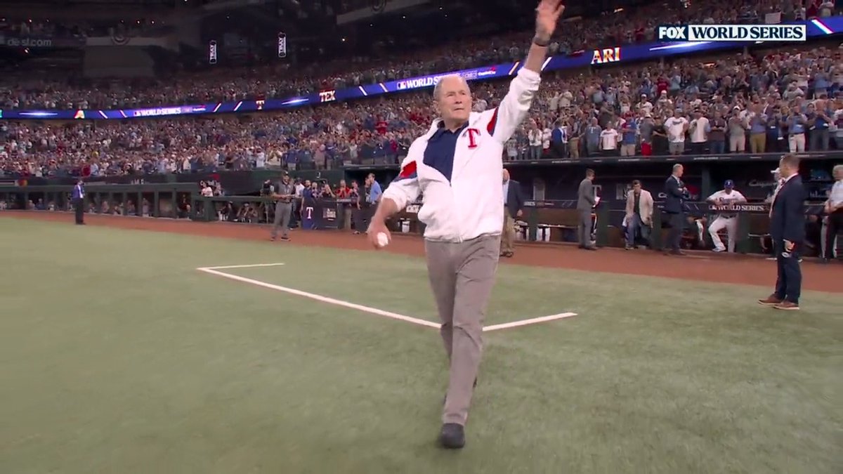 Former President George W. Bush delivers the first pitch before Game 1 of the #WorldSeries in Texas.