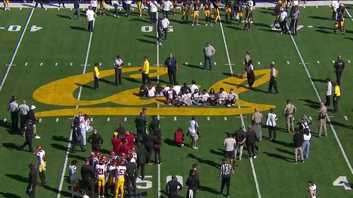 The USC vs Cal game is delayed due to a protest at the 50-yard line