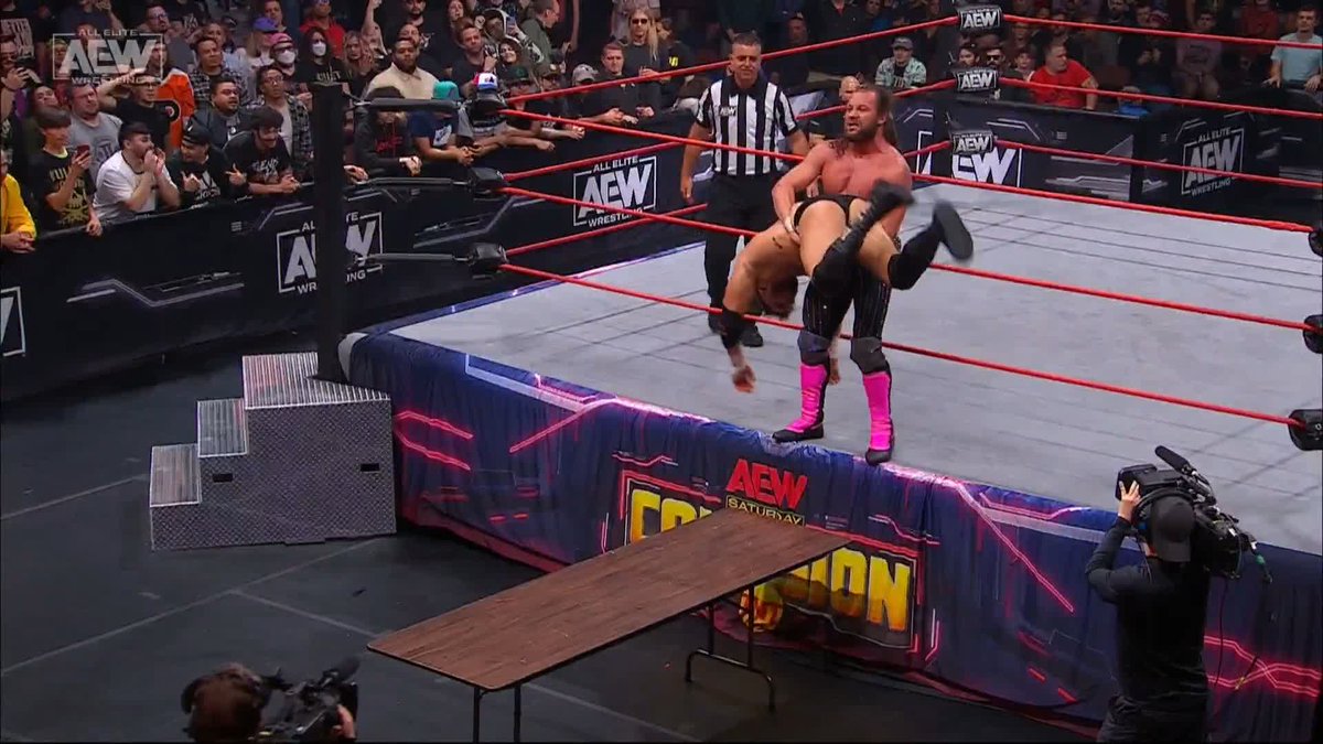 Kenny Omega sends MJF through the table on the outside! Watch #AEWCollision LIVE on TNT! #AEWWorldTitle Maxwell Jacob Friedman™️ | Kenny Omega